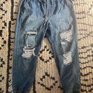 Fashion Nova Relaxed Blue Jeans with Distressed Style